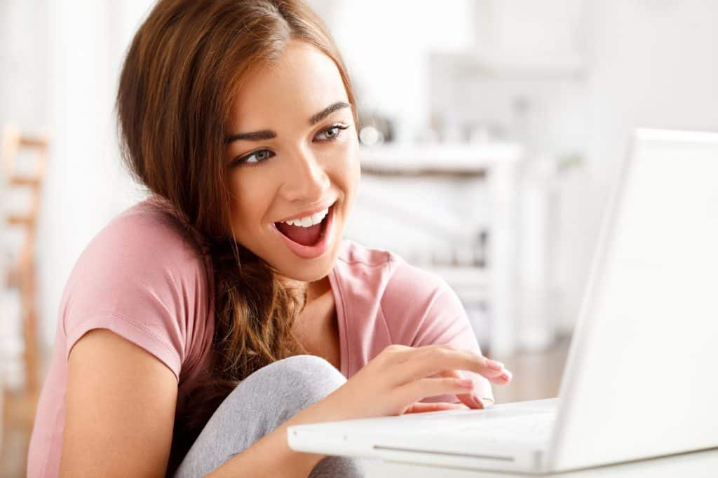 Woman Looking Happy Using The Computer